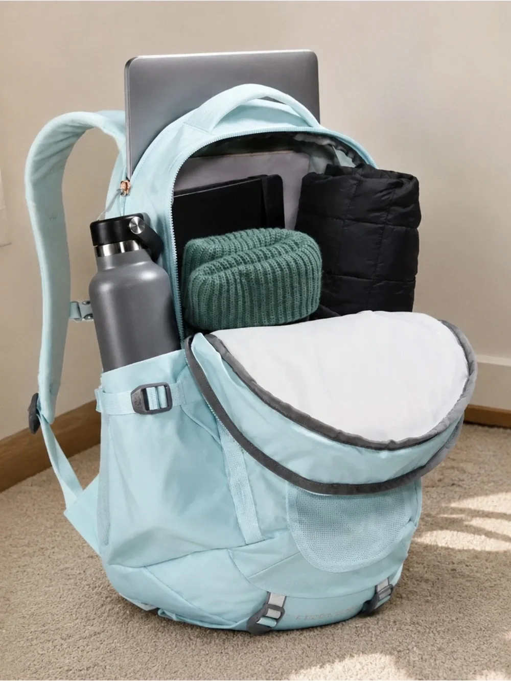 The North Face Pale Blue Backpack with Peach Accents - Men's